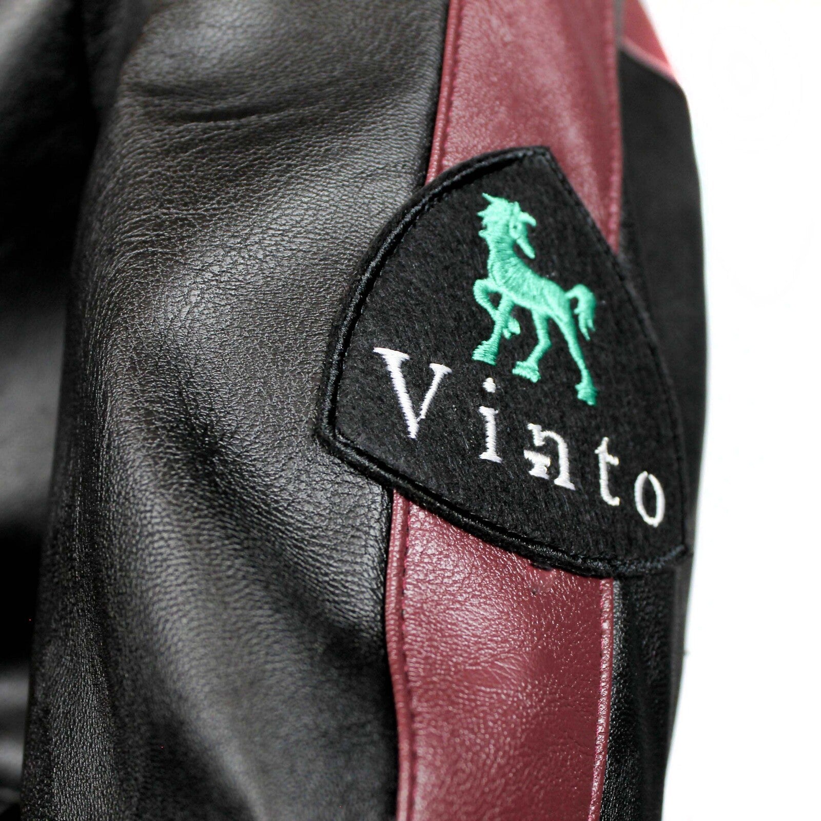 Bomber in pelle ecologica nero e prugna 4